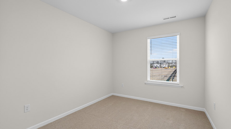 Bedroom with carpet floor and closet