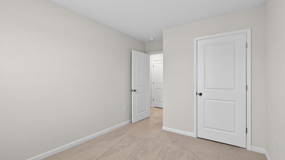 Bedroom with carpet floor and closet