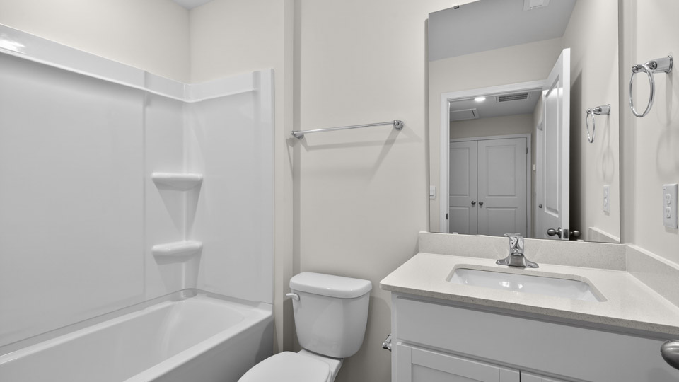 Bathroom with sink and tub