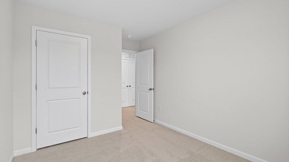 Bedroom with carpet floor and closet