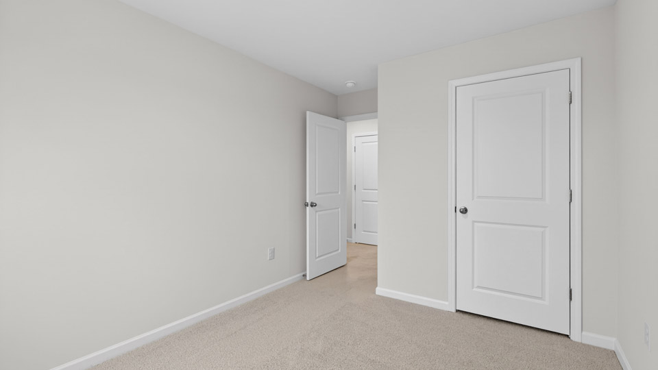 Bedroom with carpet floor and closet