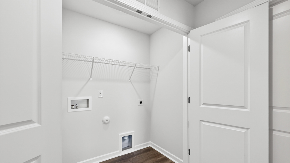 laundry room with wire shelving