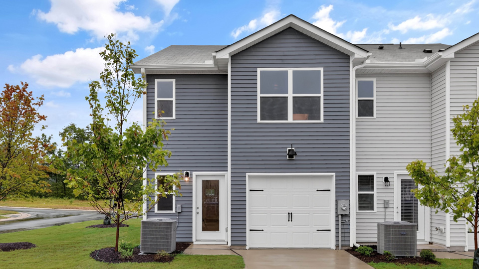back exterior with rear load garage