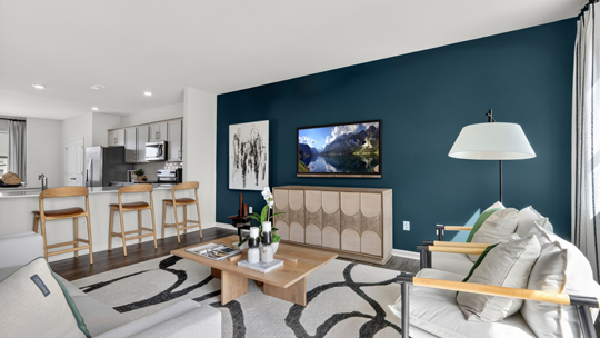 living room with revwood flooring