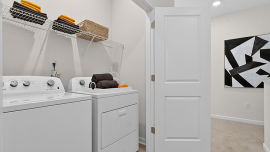 laundry room with wire shelving