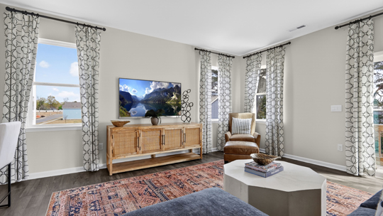 open concept living space with large windows