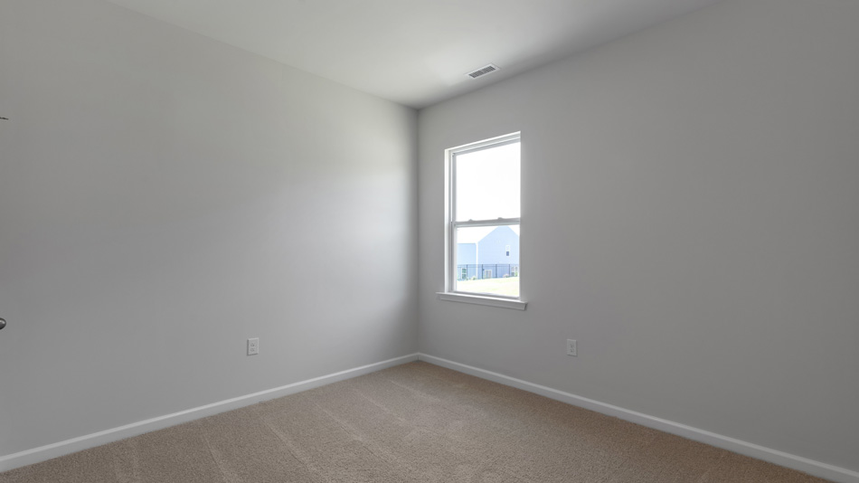 Bedroom with carpet