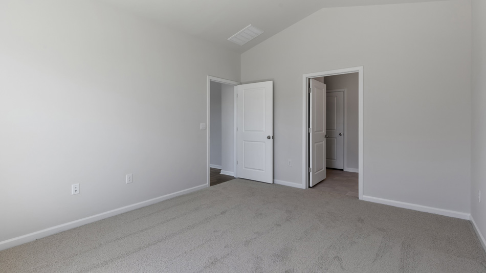 Bedroom with carpet