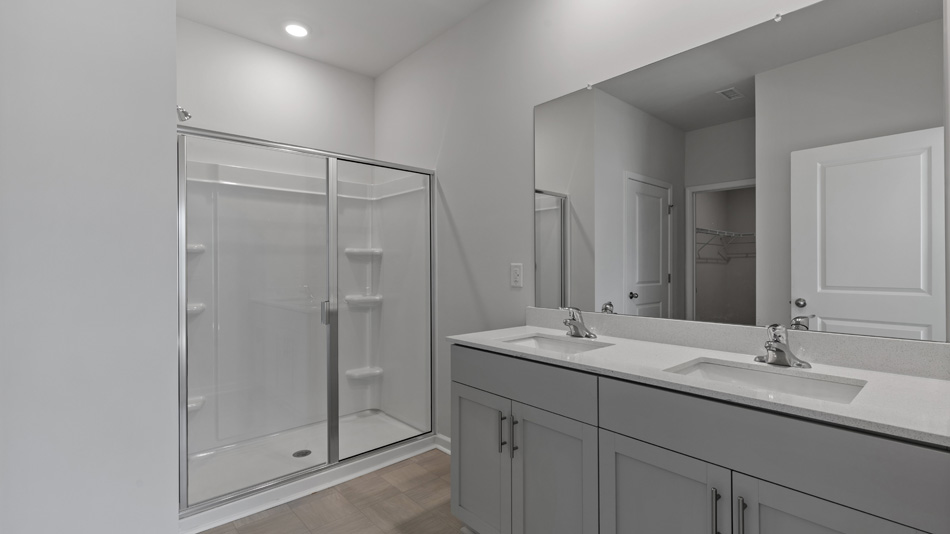 Bathroom with grey cabinets