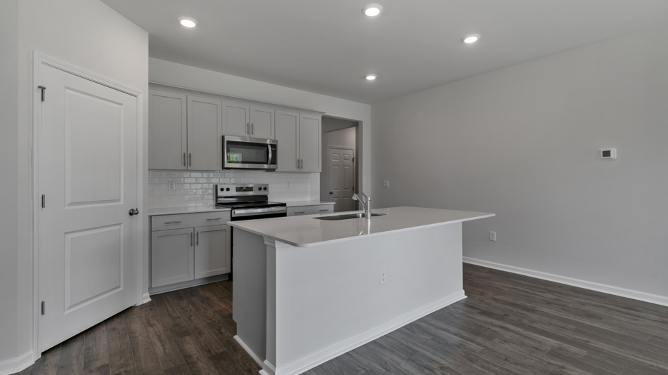 Kitchen with white cabinets