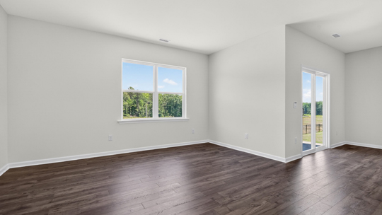 open concept living room with revwood flooring