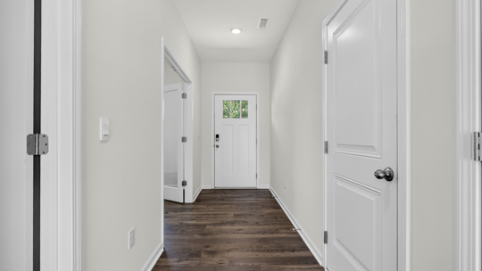 foyer entryway with revwood flooring