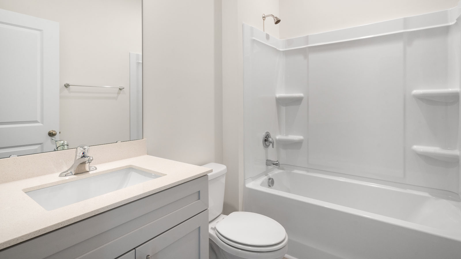 Bathroom with white cabinets