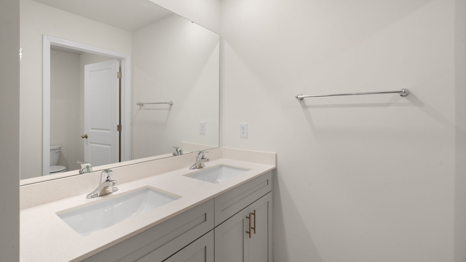 Bathroom with white cabinets