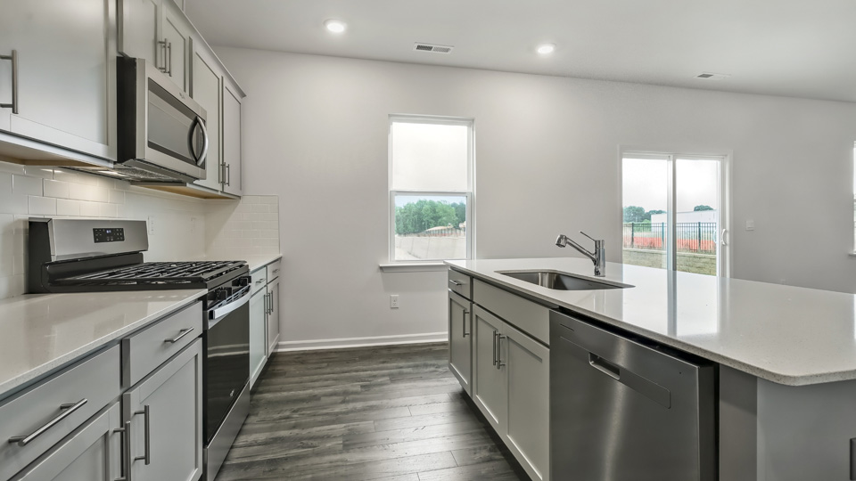 Kitchen with grey cabinets