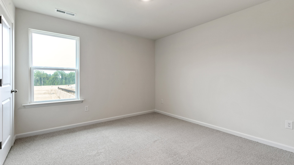 Bedroom with carpet