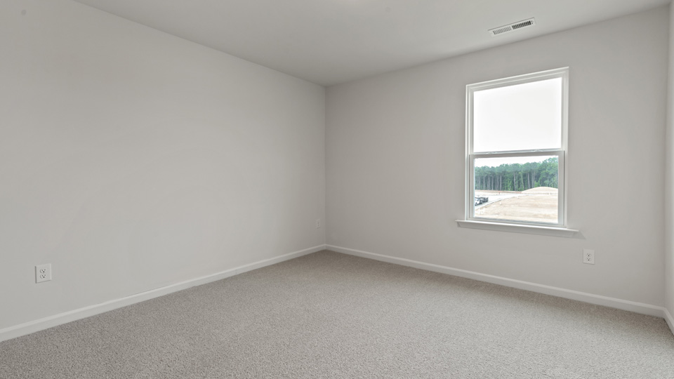 Bedroom with carpet