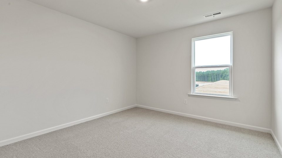 Bedroom with carpet