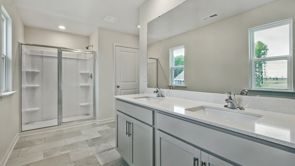 Bathroom with white cabinets