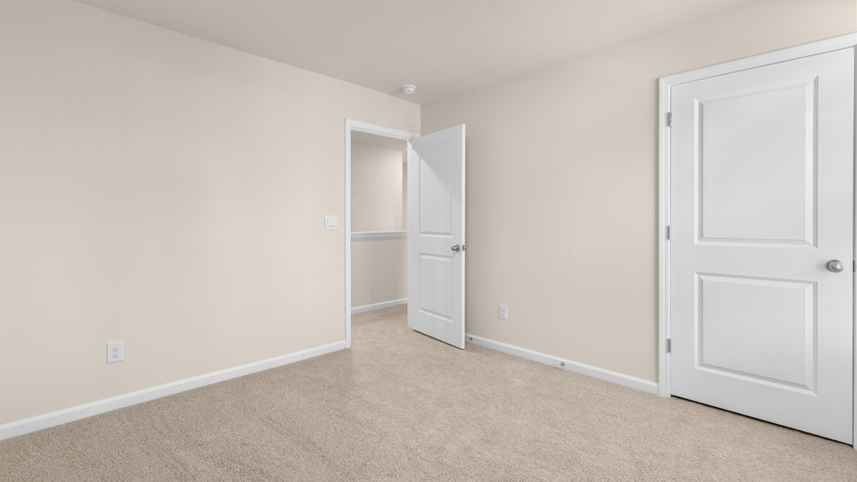 Bedroom with carpet