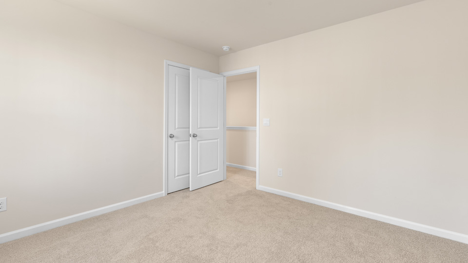 Bedroom with carpet