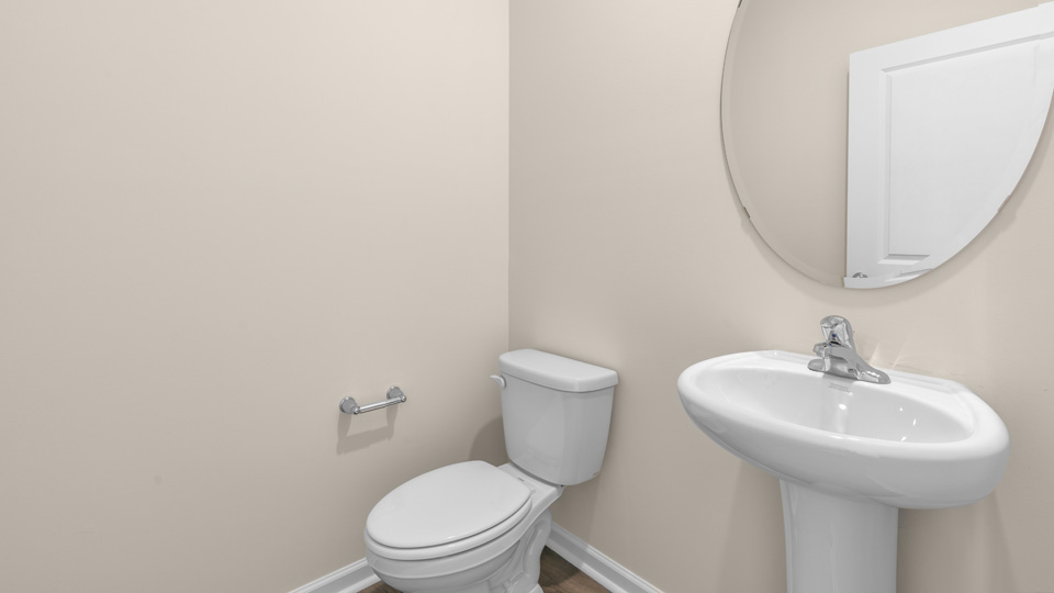 Bathroom with white cabinets