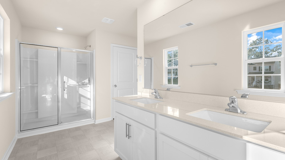 Bathroom with white cabinets