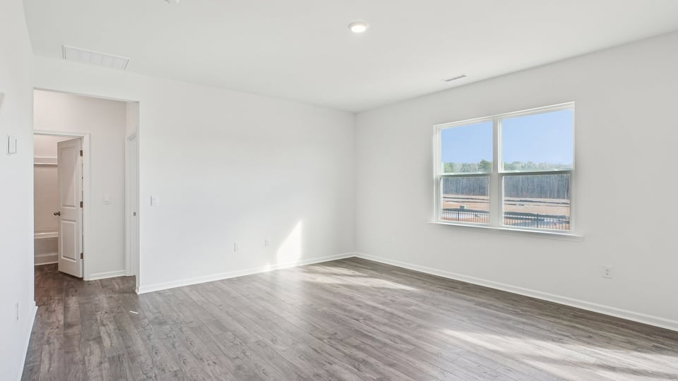 open concept living room with revwood flooring