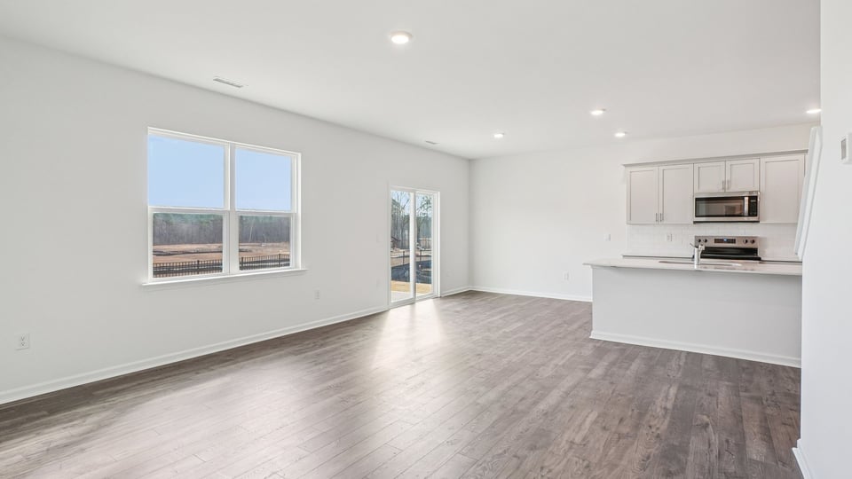 kitchen overlooking dining area with sliding glass doors