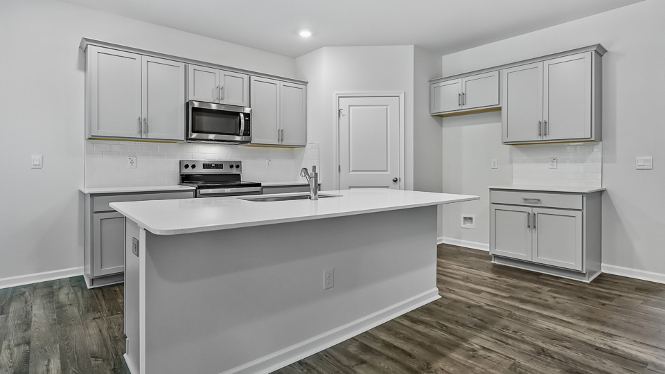 Kitchen with white cabinets