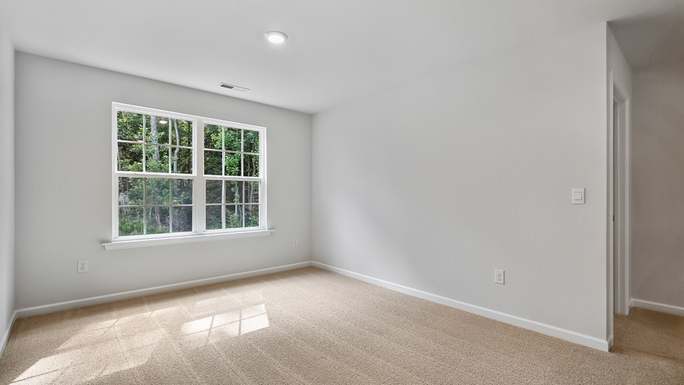 Loft area with carpet