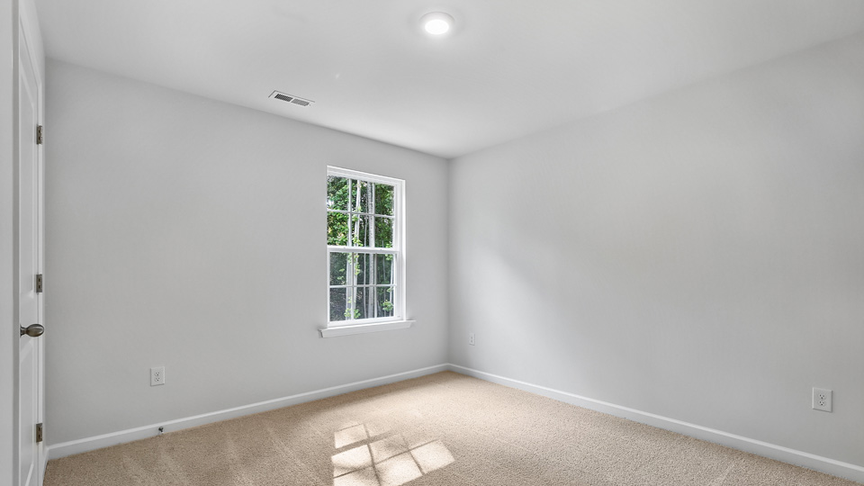 Bedroom with carpet