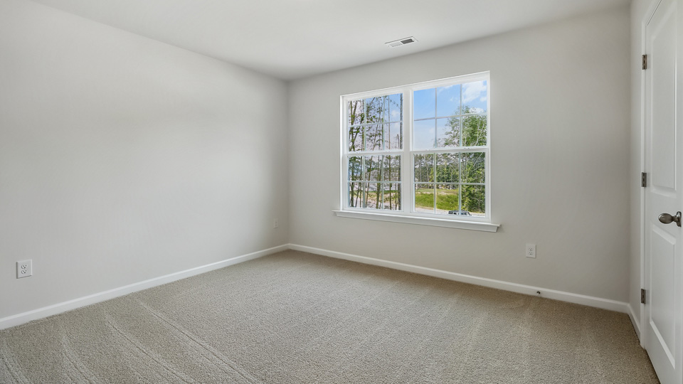Bedroom with carpet