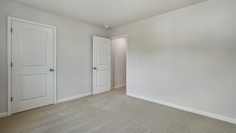 Bedroom with carpet