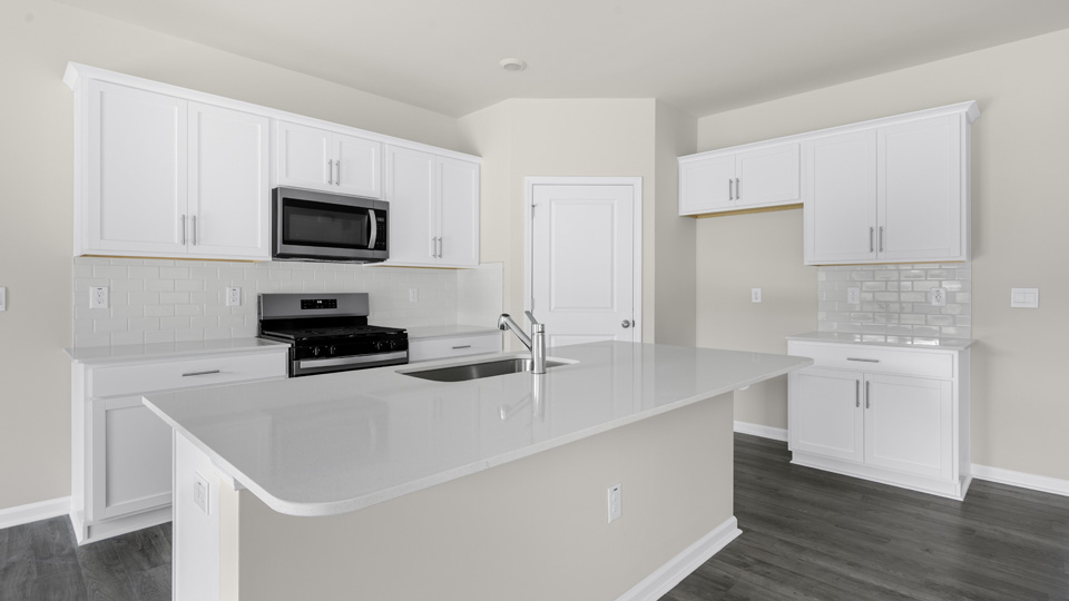 Kitchen with white cabinets