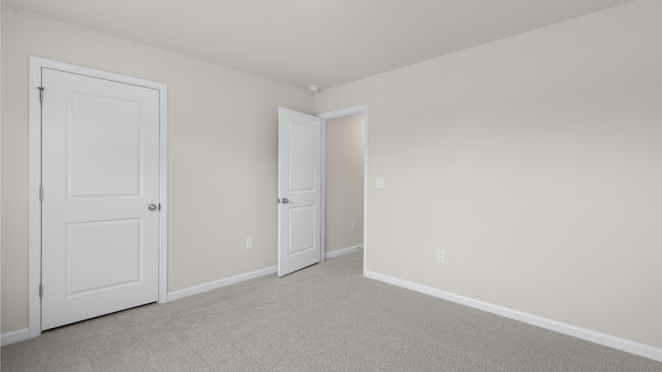 Bedroom with carpet