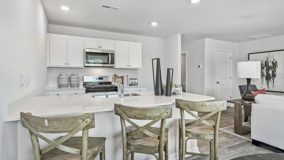 kitchen with white countertops and white cabinets