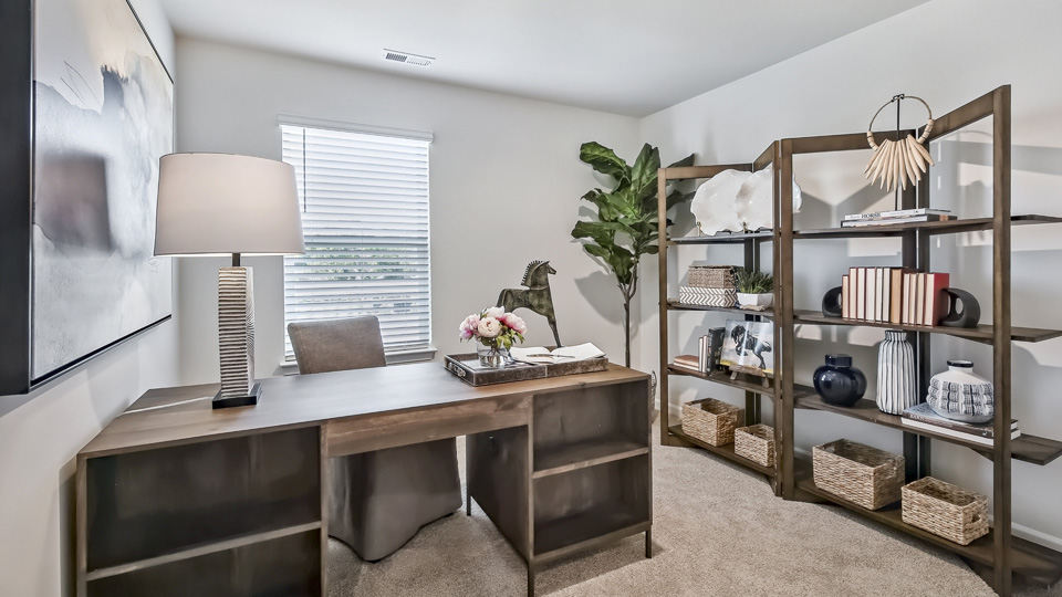 bedroom or home office with carpet flooring