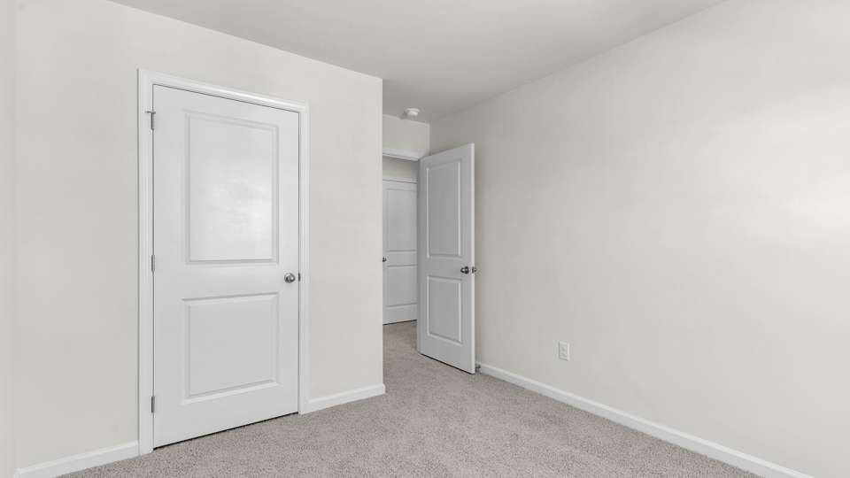 Bedroom with carpet flooring