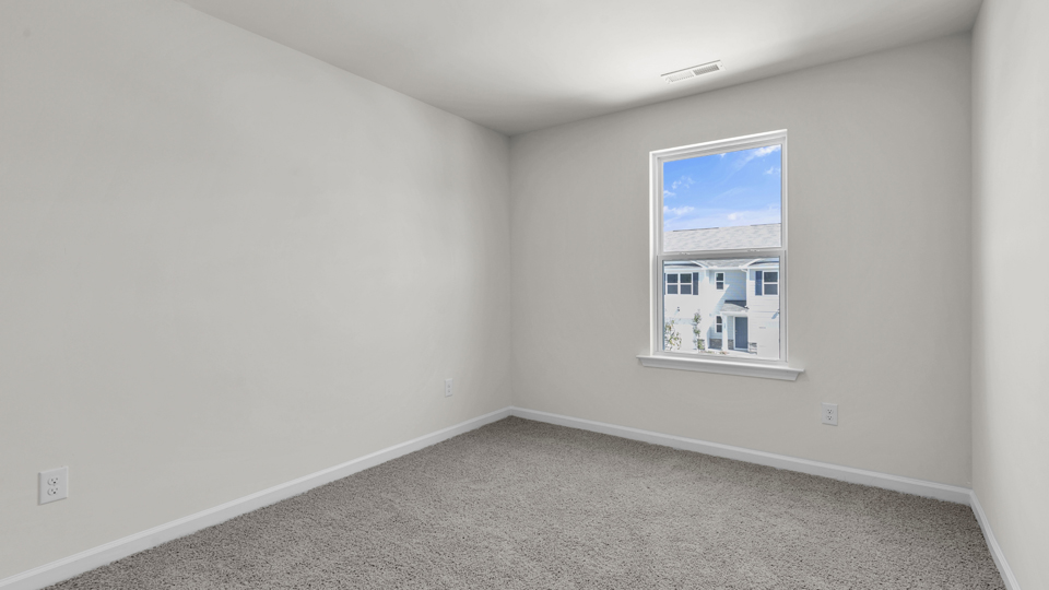 Bedroom with carpet flooring