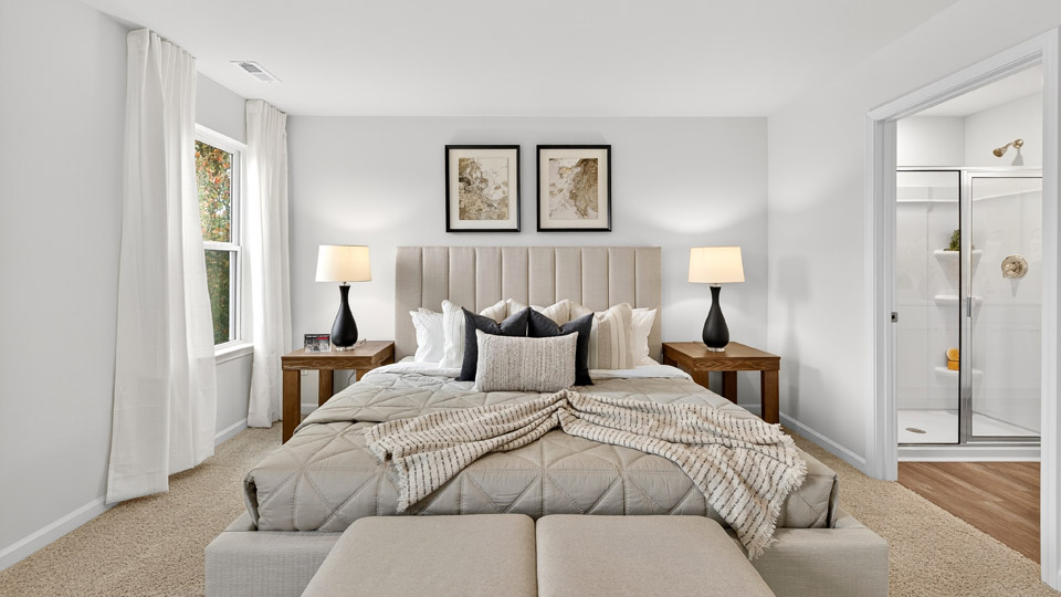 bedroom with natural lighting and carpet flooring