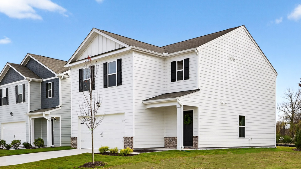 Taylor exterior with brick skirt and vinyl siding
