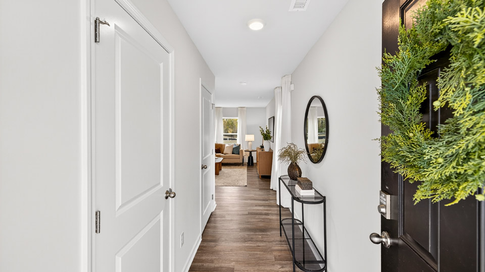 foyer entryway with revwood flooring