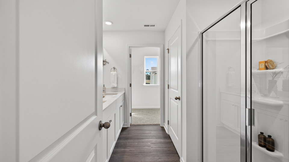 primary bathroom with walkin glass door shower
