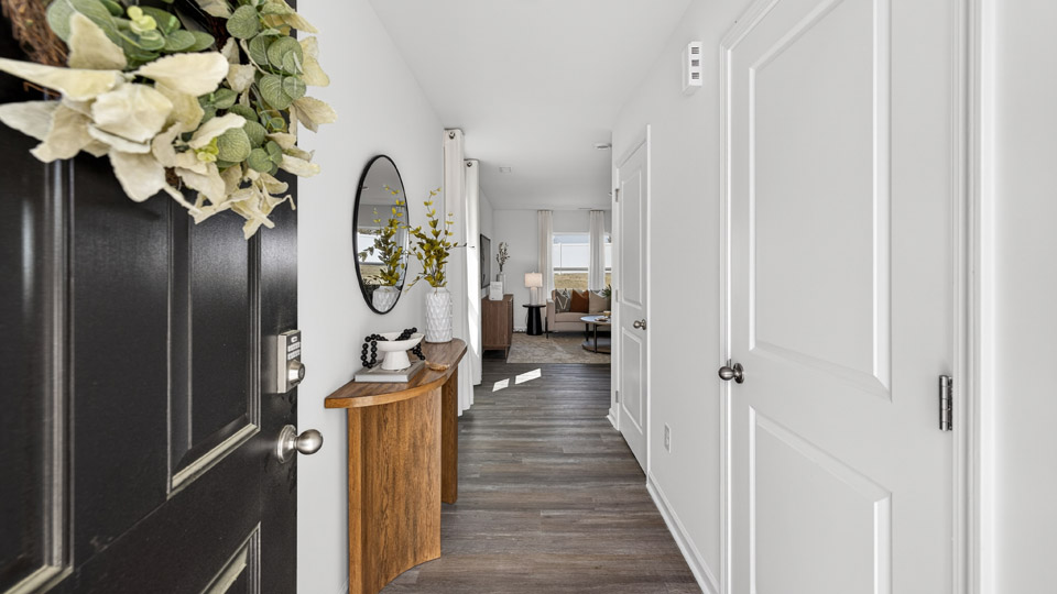 foyer entryway with revwood flooring
