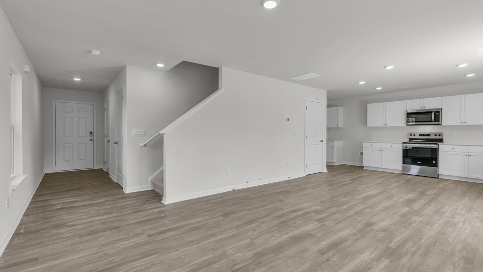 open concept living space with large windows