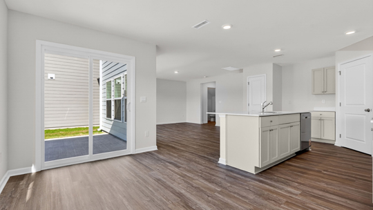 kitchen and breakfast area with sliding glass doors