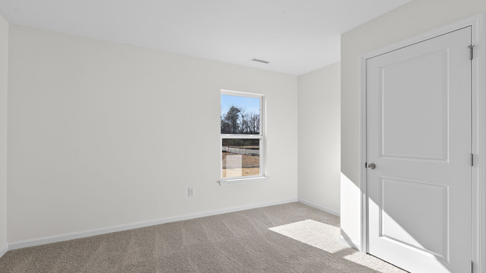 Bedroom with carpet floor and closet