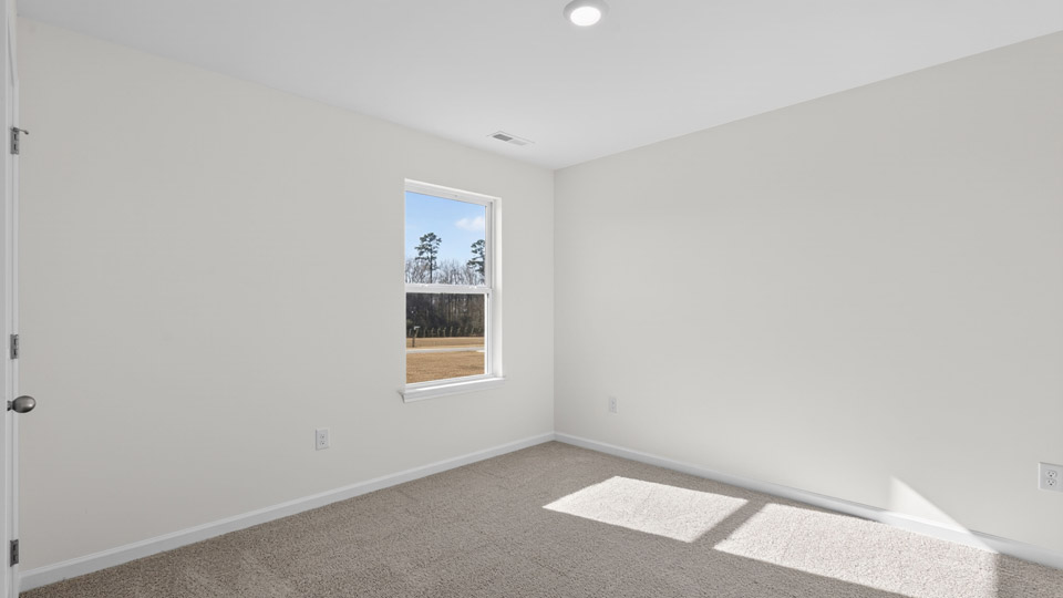 Bedroom with carpet floor and closet