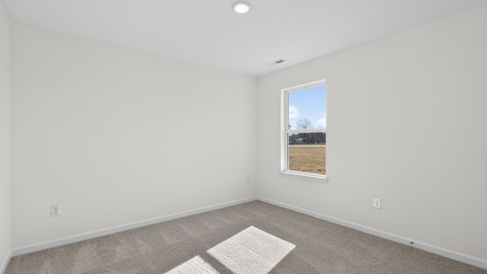 Bedroom with carpet floor and closet
